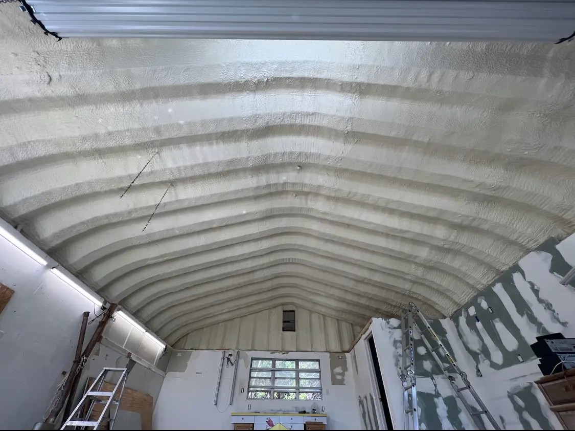 Spray polyurethane foam applied to the underside of a metal roof deck in Rio del Mar